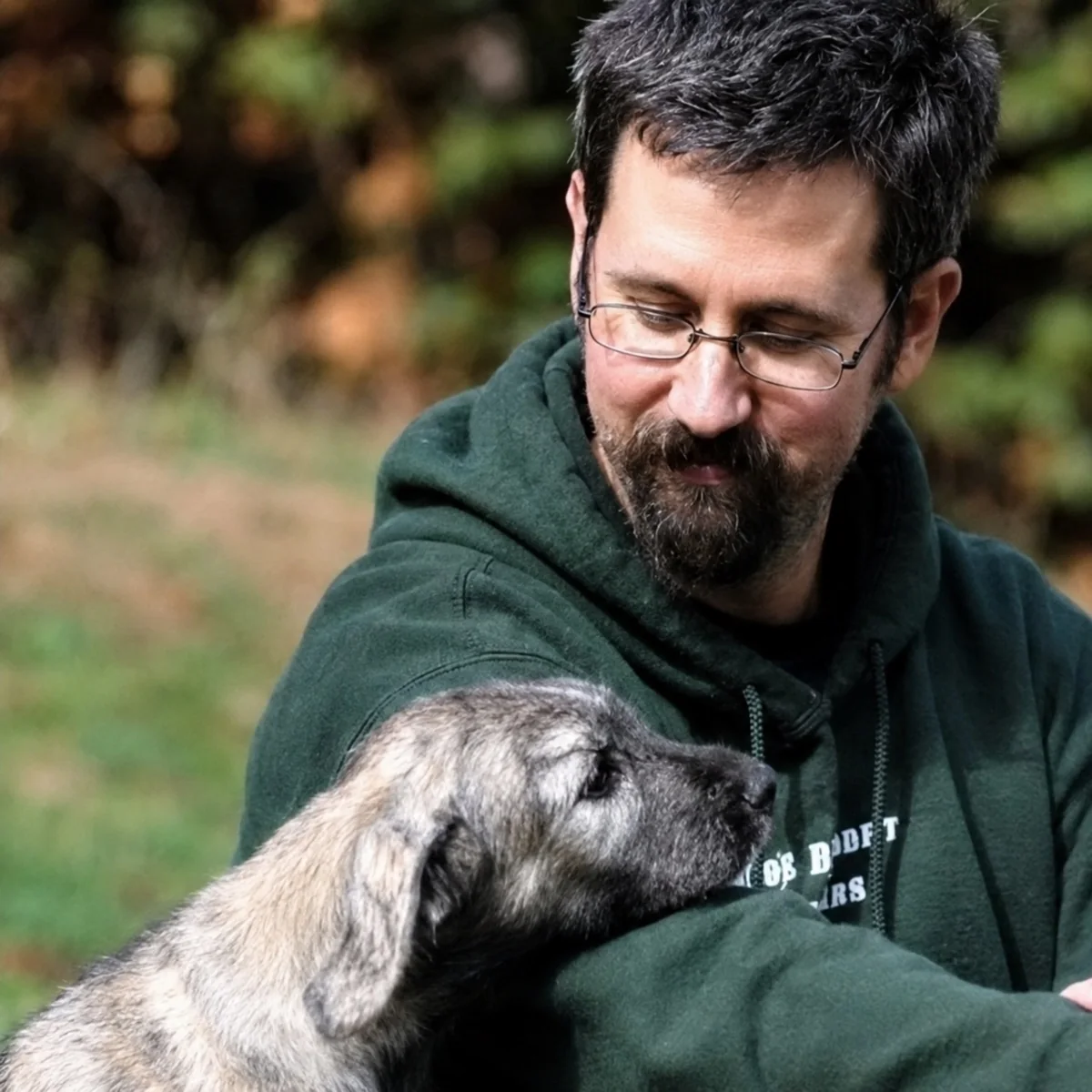 Dr. Silvan Urfer with a dog in his published portrait